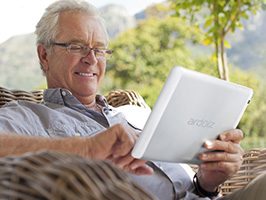 Senior couple connected on digital tablet